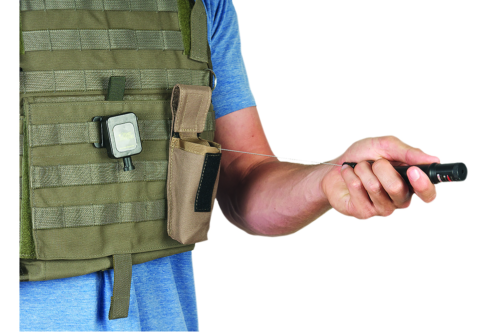 Holsters with Integrated Retractors